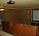 Custom home theater complete with stone pillars