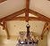 Timber trusses line vaulted ceilings