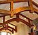 Timber trusses line the entire depth of great room