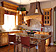 Rustic kitchen with unique timber range hood