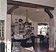 Timber beam w/corbels separating kitchen and great room